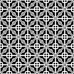 Fototapeta premium Seamless abstract geometric pattern in black and white, consisting of repeating symmetrical shapes. Suitable for backgrounds, wallpapers, textile designs, prints, decorative projects, etc.
