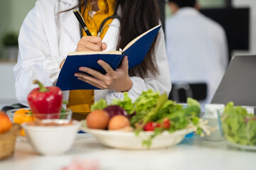 Microbiologists and nutrition experts analyze molecular samples in advanced food science labs, exploring innovations in nutrition, psychiatry, and health science research.