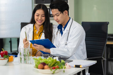Microbiologists and nutrition experts analyze molecular samples in advanced food science labs,...