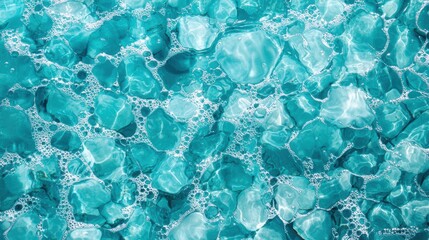Obraz premium Crystal clear turquoise water with bubbles and reflections