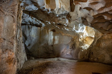 Interior of the large hall of old Karain cave, hidden in Mediterranean region. Confirms human...
