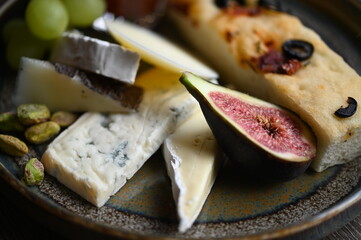 delicious appetizing cheese with meat and vegetables on plate