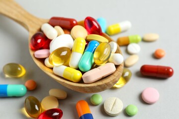 Various pills on a colored background