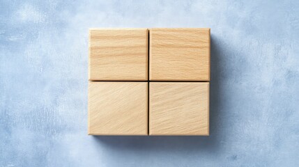 Vibrant blue background with assorted wooden cubes in geometric arrangement for design inspiration.