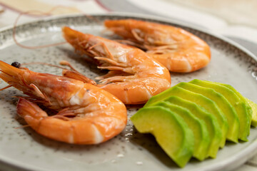 Boiled large shrimps on plates.Food concept.Seafood.Diet