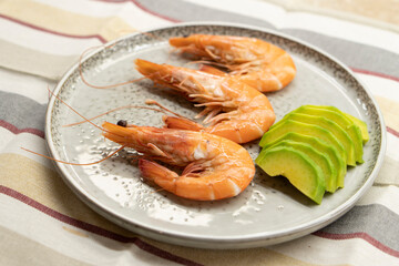 Boiled large shrimps on plates.Food concept.Seafood.Diet
