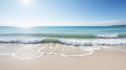 A serene beach scene featuring gentle waves lapping against the shore under a clear blue sky.