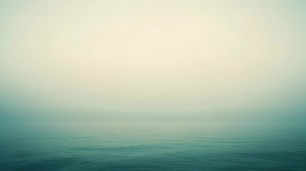 Obraz premium A serene seascape shrouded in fog, evoking tranquility and contemplation.