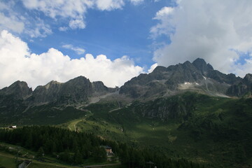 Obraz premium Italian Alps top cloudy sky