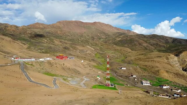 An aerial view of komic village with beautiful himalaya mountains and komic monastery. Komic village is the world's highest motorable village in spiti valley, himachal pradesh, India.