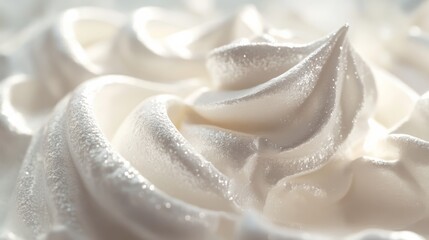 Whipped cream styled like a cascading waterfall in pearlescent silver hues, floating on white