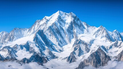 Obraz premium Majestic Snow-Capped Mountain Landscape Under Clear Blue Sky Displaying Stunning Peaks, Glaciers, and a Serene Environment Ideal for Adventure and Travel Enthusiasts