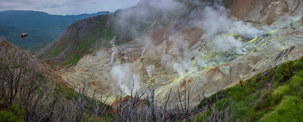 Owakudani volcanic valley in Hakone, Japan is open to visitors and accessible by road or cable car.