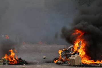 Fires Set by Protesters Burning Barricades During National Shutdown