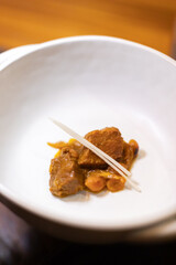 Yellow curry with pork, ginger and garlic