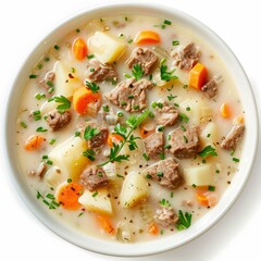 Bowl of hearty beef and vegetable soup garnished with fresh herbs, perfect for a comforting meal