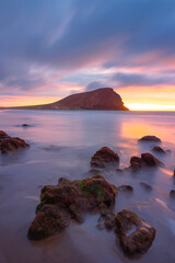 Long exposure at sunrise on La Tejita beach in Tenerife
