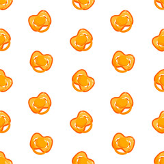 Orange dummies vector seamless pattern. Front view pacifiers. Background, print, packaging design