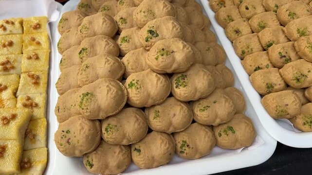 Nolen gur er Sandesh sold in different variety in a shop in Kolkata, India.