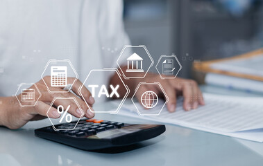 Finance or income concept. calculating taxes online. Personal income statement, man using calculator to fill out personal or business income tax payment form for government agency on virtual screen