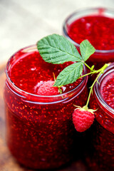Raspberry jam in canning jars. Berry jam made from fresh home-grown fruits. 