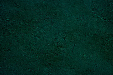 Dark Green or Teal Textured Wall Providing A Minimalistic and Abstract Background