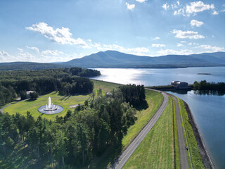aerial view of the ashokan reservoir in upstate new york (near woodstock olivebridge) nyc drinking water and catskill mountains (catskills hills background) park road walkway bridge crossing lake pond