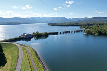 aerial view of the ashokan reservoir in upstate new york (near woodstock olivebridge) nyc drinking water and catskill mountains (catskills hills background) park road walkway bridge crossing lake pond