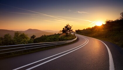 curving road at sundown with mild trails