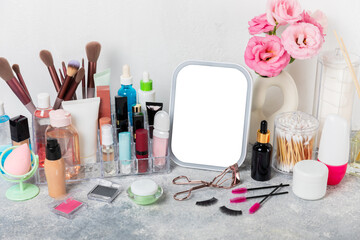 Storage of cosmetics on dressing tabl.Cosmetic box on the dresser. Set of body care cosmetic products. Decorative and care product. Cosmetic bag. Storage box. Beauty concept. Makeup. Space for text.