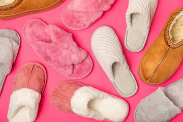 Soft slippers on a bright colored background, close-up. House slippers. Comfortable shoes for home. Foot care concept. Home comfort. Space for text. Copy space.