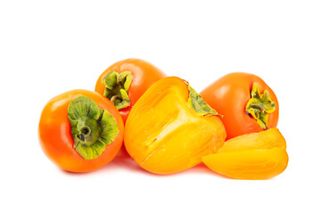 Persimmon isolated on white background. Persimmon fruit. Slice of ripe, juicy, sweet persimmon fruit. Vegan. Fruit garden. Close-up.