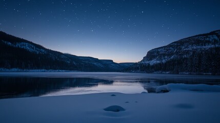 Fototapeta premium A serene winter landscape at twilight with a frozen lake and starry sky.