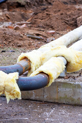 There are a couple of pipes that have been covered in insulation