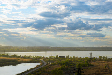 Obraz premium Top view of the picturesque natural and urban landscape at sunset