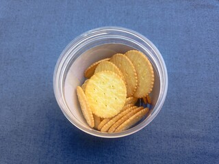 Salty round cracker isolated on white background, top view. Tasty crackers isolated. Dry salty cracker cookies isolated.
