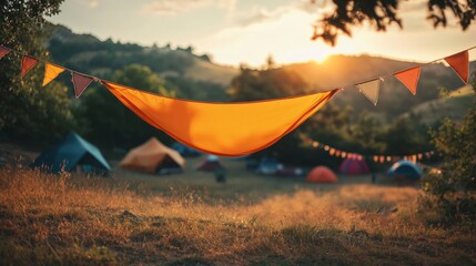 Vibrant Camping Scene with Sunset and Colorful Bunting