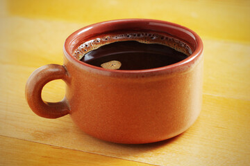 Coffee in brown cup