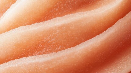Fototapeta premium Smooth Textured Surface of Soft Peach Creamy Material Close-Up