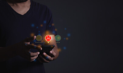 Customer Review, Young man hand holding smartphone to review and gives 1 star, with poor service results, Bad review Rated just 1 star Feedback options