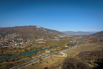 Autumn view from Jvari Monastery overlooking the historic town of Mtskheta and the Georgian...
