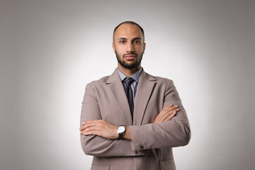 Portrait of businessman on light gray background