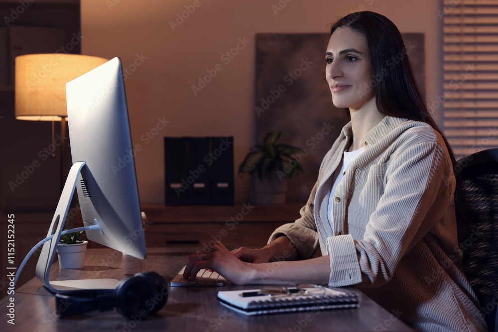 Poster programmer working on computer at wooden desk indoors