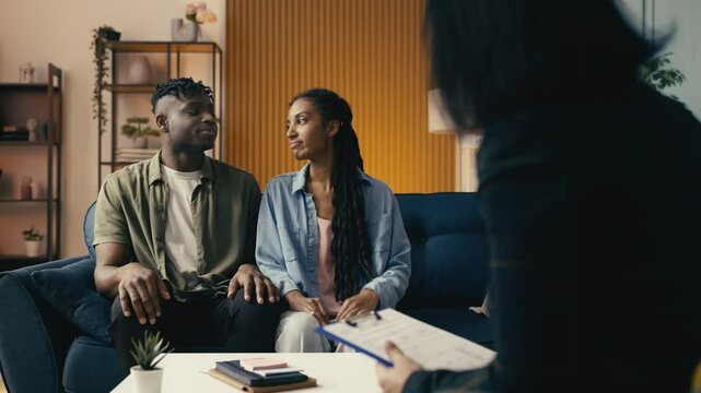 African American man and woman visit a marriage counselor, relationship therapy