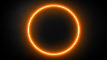 A glowing orange circular light against a dark background creates a striking and modern visual.