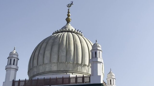 video footage taken from the outside of the tomb of Hazrat Imam Rabbani Ahmed Faruk, an Islamic scholar and Sufi who lived in the 15th century, in the city of Sirhind, India.