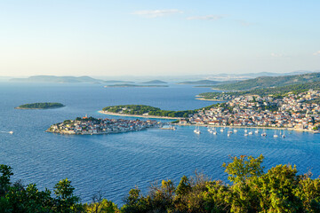 Fototapeta premium Beautiful aerial view of Adriatic coastline and Primosten old town with marina, Croatia