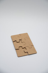 monochromatic puzzles in a pile lying on a white background