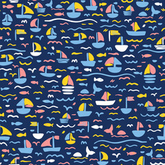 Colorful nautical sea life seamless repeat pattern. Hand drawn, vector boats, waves, fishes, wales and birds aop, all over print on dark blue background.