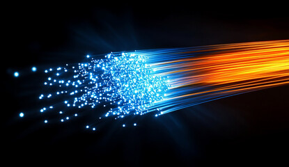 A close-up of an illuminated blue and orange fiber optic cable, with light rays emanating from the center